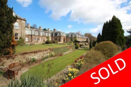Exclusive gated development. Charming East Coast apartment.